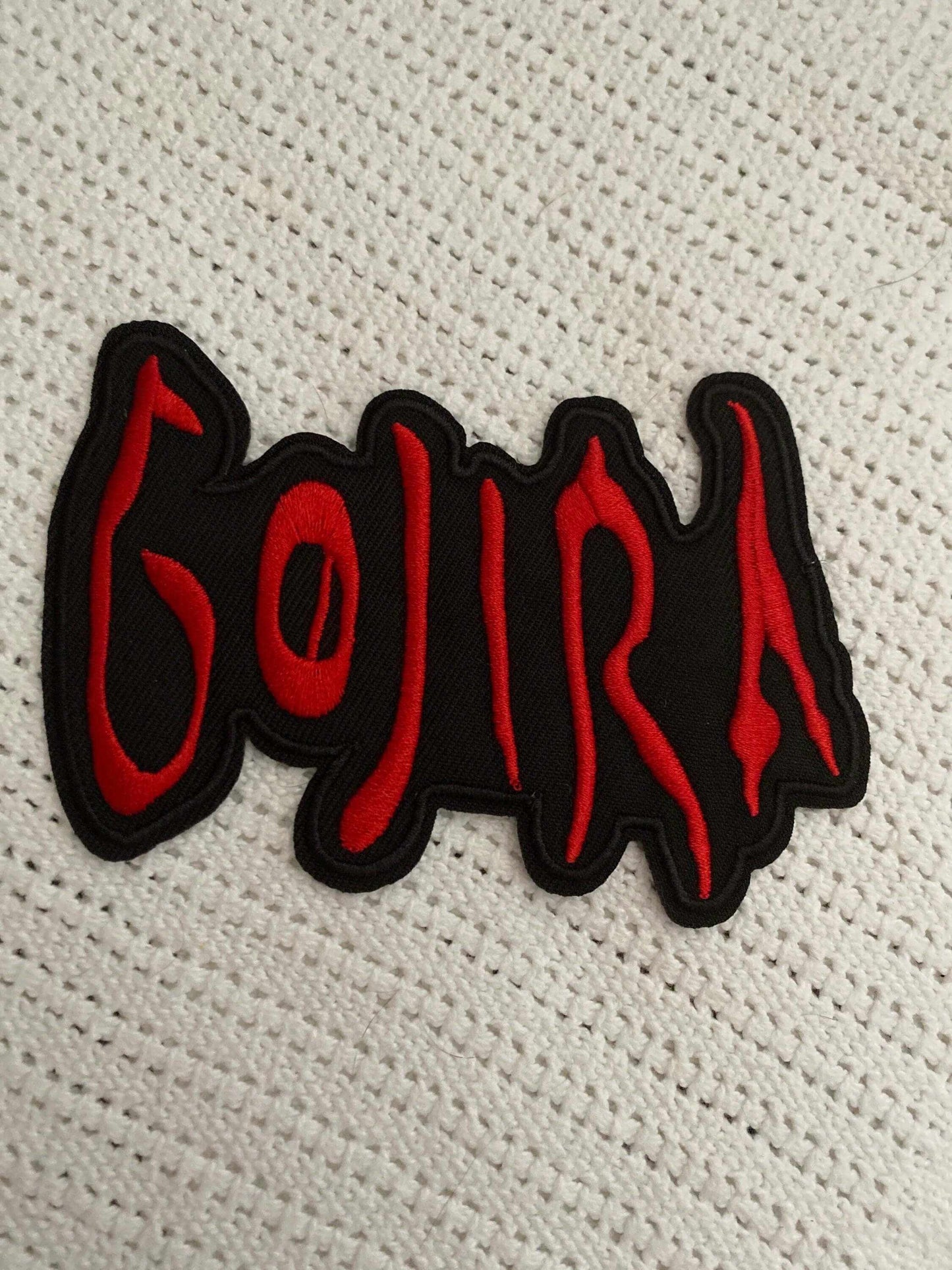 Gojira logo patch with red lettering on black background for metal fans