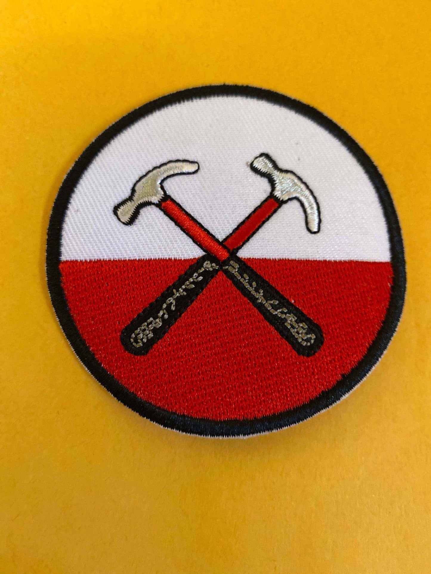 Embroidered Marching Hammers patch inspired by Pink Floyd's The Wall with crossed hammers on red and white background