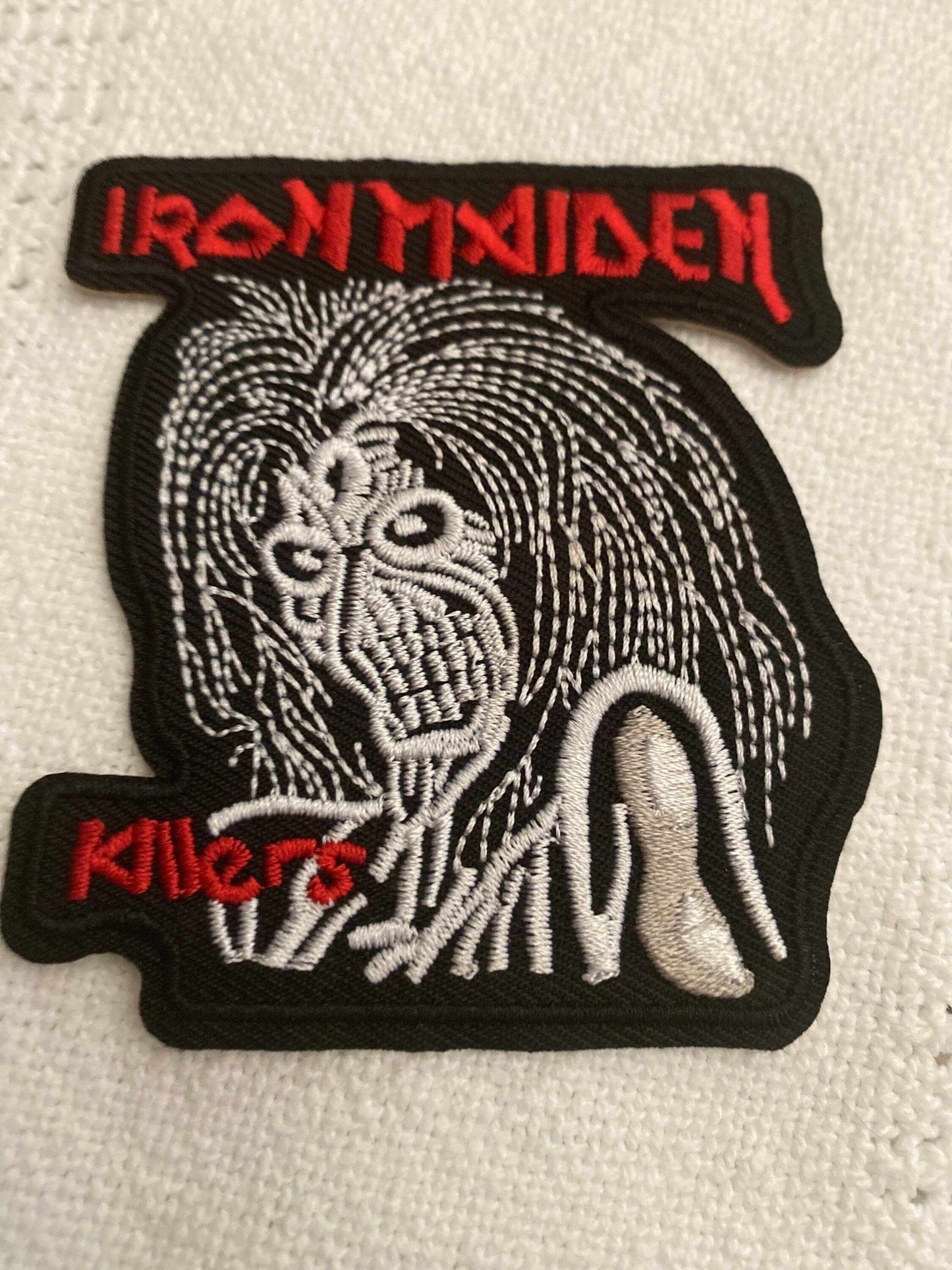 Iron Maiden Killers embroidered patch featuring iconic album artwork in red, white, and black colors