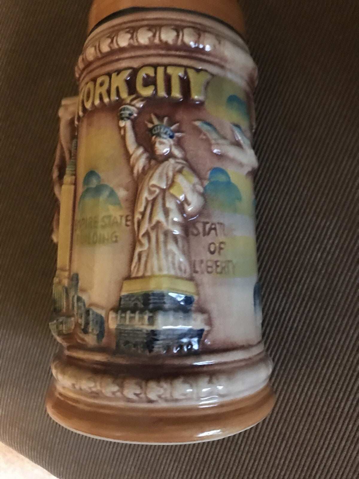 1970’s NYC Souvenir Stein featuring raised multi-color design of WTC and plane called The Premonition mug from early 70’s Japan