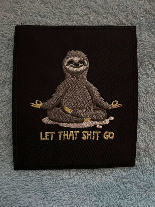 Let That Shit Go patch silver and black embroidered iron-on 4x3.75 inches motivational design