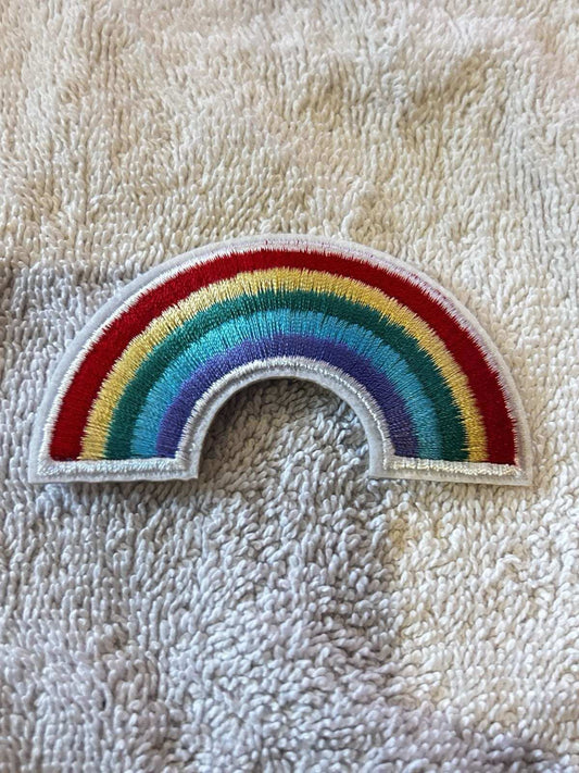 Rainbow embroidered iron-on patch 3x2 inches for bags, jackets, and jeans with colorful embroidery design