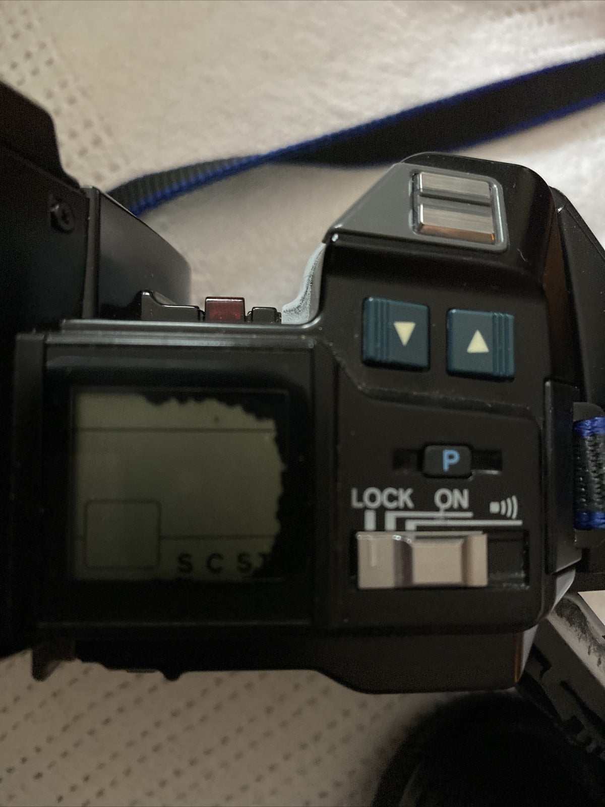 Black Minolta 7000 SLR 35mm camera with 50mm f/1.7 lens and Milisi electronic flash