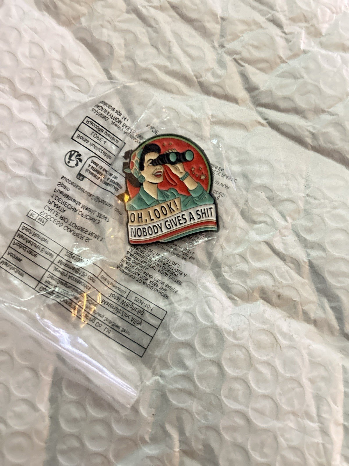 Oh Look! Nobody Gives a Sh*t retro enamel lapel pin, 1.5 inch round, metal and enamel, individually wrapped