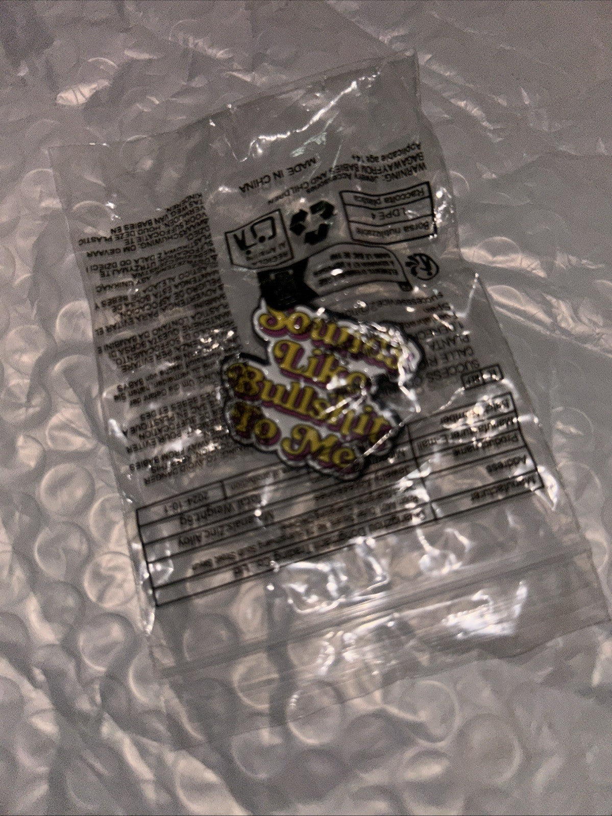 Sounds Like Bull$hit to Me humorous lapel pin 1.25 inch square single packed