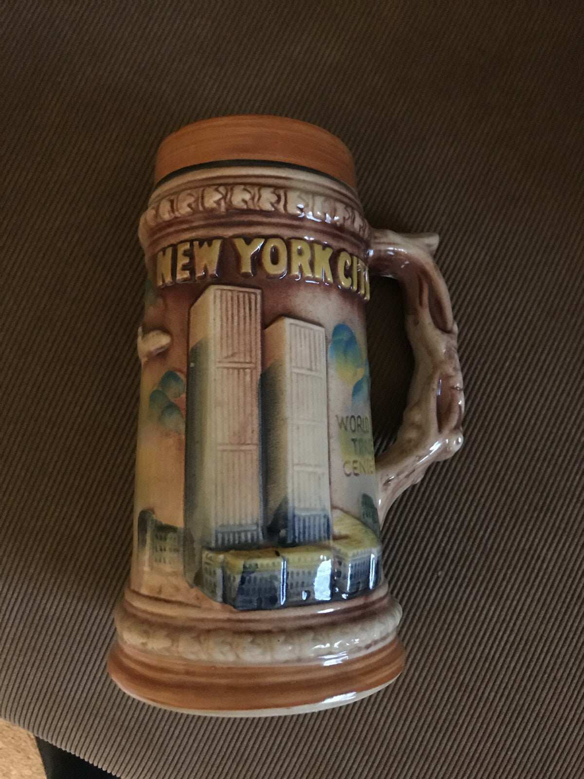 1970’s NYC Souvenir Stein mug with raised multi-color design of World Trade Center and plane from early 70s