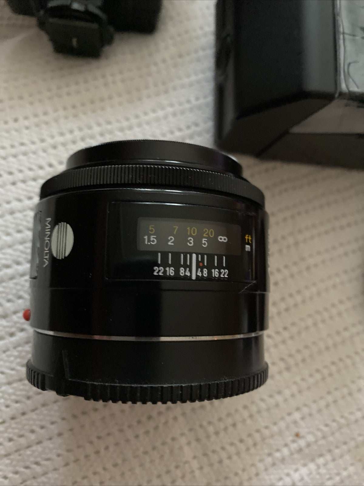 Minolta 7000 SLR black 35mm camera with 50mm f/1.7 lens and Milisi electronic flash